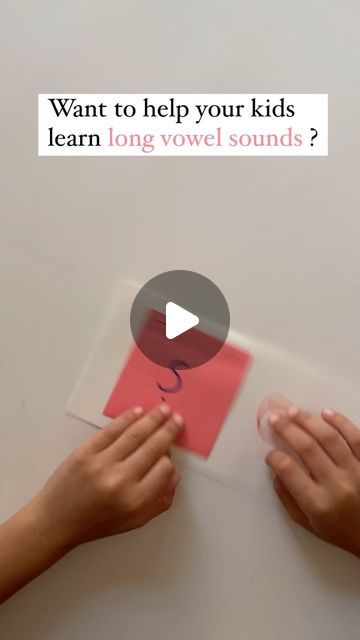 two hands holding a piece of paper with the words, want to help your kids learn long vovel sounds?