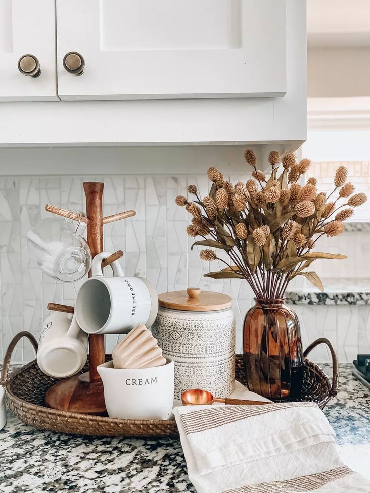 the kitchen counter is clean and ready to be used as a holder for coffee mugs