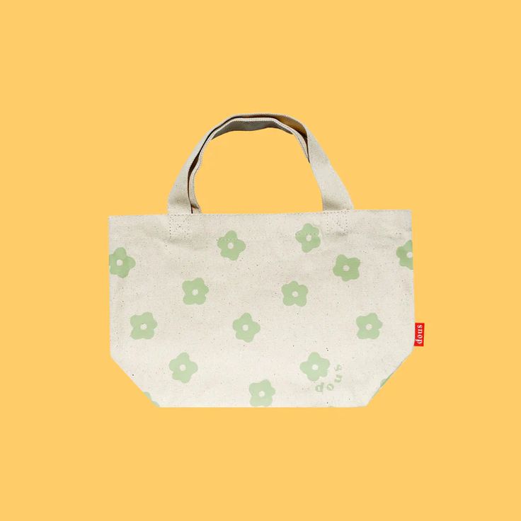 Flower Power Mini Tote Bag – shopdous Spring Green Canvas Bag, Green Canvas Bag For Spring, Cotton Flower-shaped Bag For Daily Use, Green Eco-friendly Canvas Bag, Green Eco-friendly Tote Canvas Bag, Green Eco-friendly Canvas Tote Bag, Green Flower-shaped Everyday Bags, Green Tote Bag With Eco-friendly Ink, Green Canvas Bag With Eco-friendly Ink As Gift