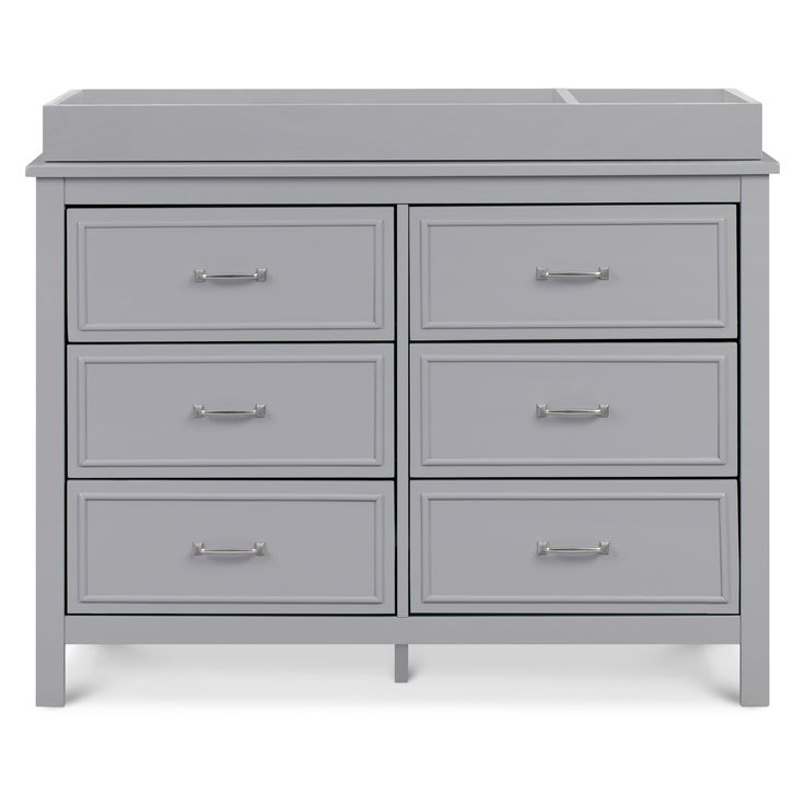 a gray dresser with six drawers and two doors on the top, in front of a white background