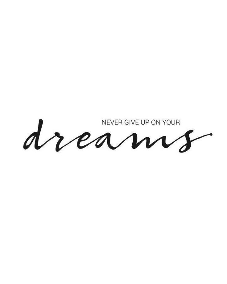 the words'never give up on your dreams'written in cursive writing