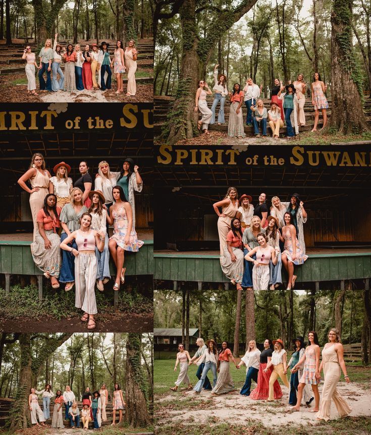 a group of people posing for pictures in front of the spirit of the sun sign