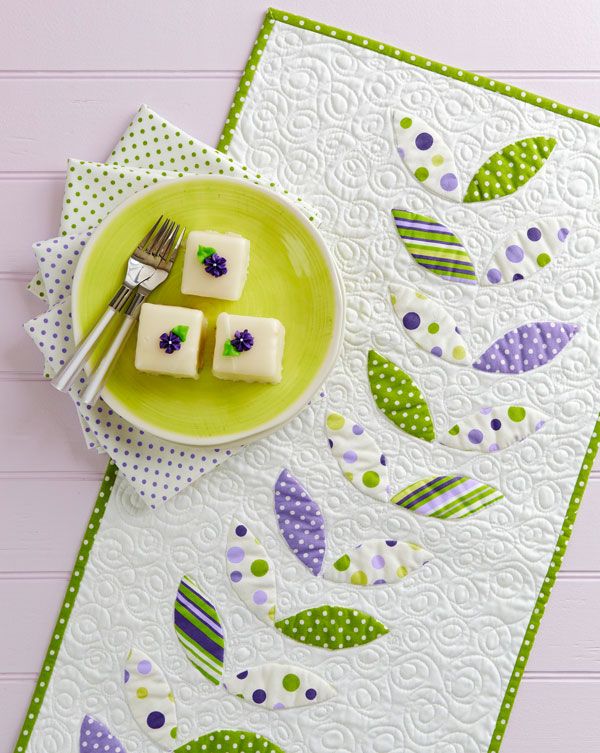 two pieces of cake sitting on top of a green plate