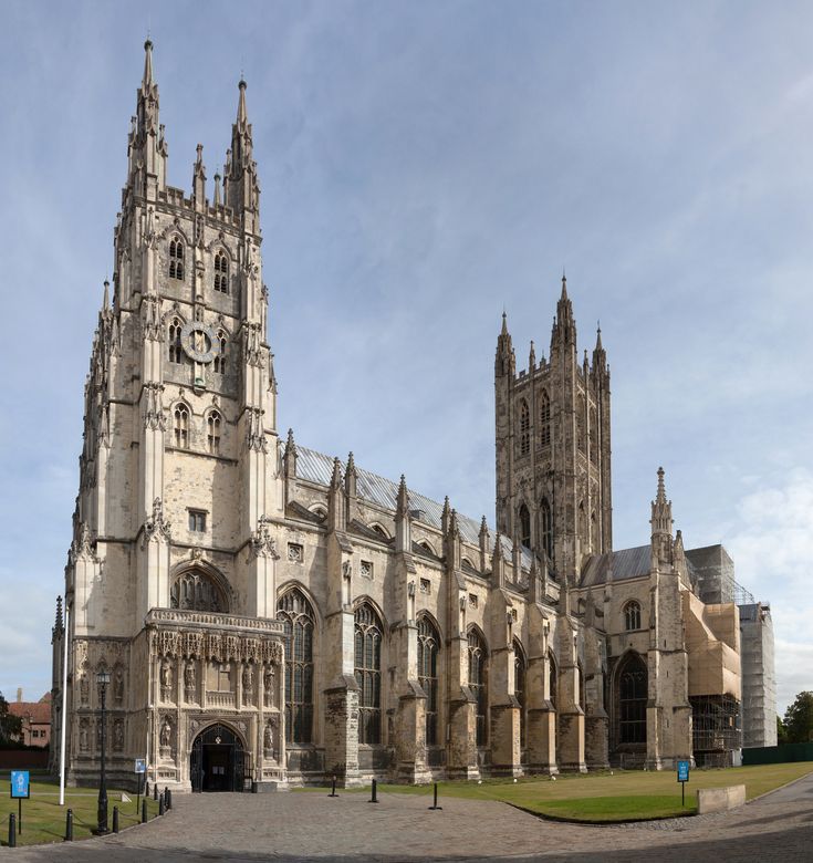 the large cathedral has two clocks on it's front and side towers that point toward the sky