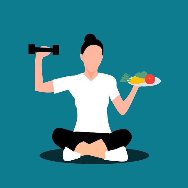 a woman is sitting on the floor holding a plate with vegetables and fruits in it