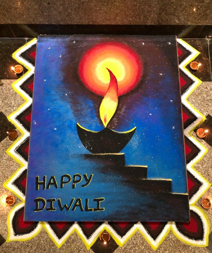 a happy diwali card with a lit candle on it