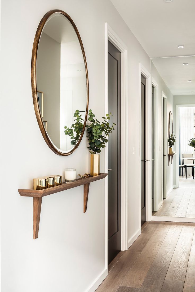 the hallway is clean and ready for us to use as an entrance way in this home