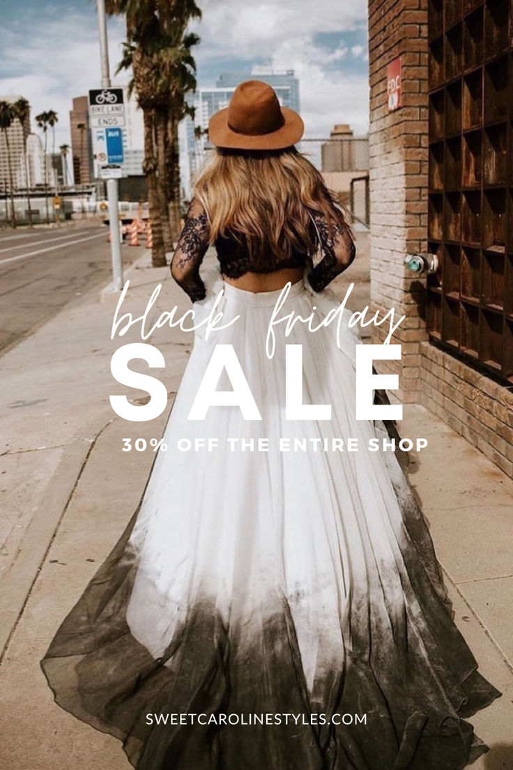 a woman walking down the street wearing a dress and hat with text that reads back friday sale 50 % off the entire shop