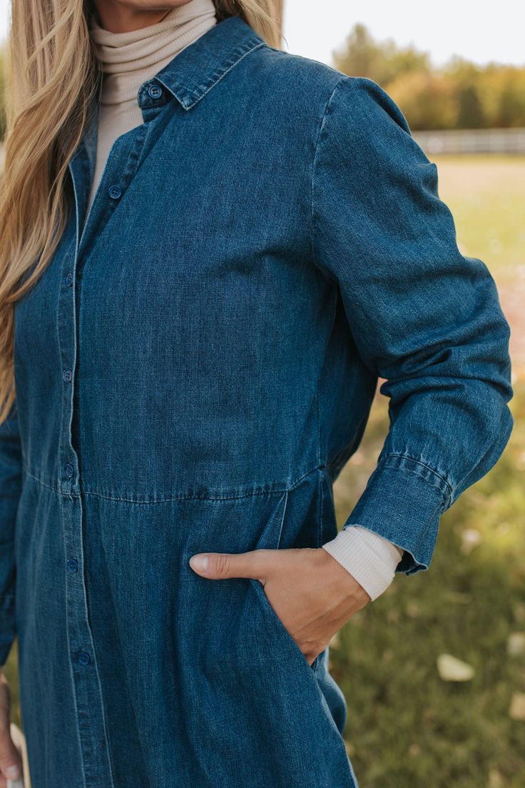 Introducing the ultimate fall fashion statement - THE DEMI BUTTON DOWN MIDI DRESS IN DENIM. This classic and cute dress features a trendy denim fabric, perfect for the season. With long sleeves, you'll be both stylish and cozy. Upgrade your wardrobe with this must-have piece! Paired with THE CONTRAST COWBOY BOOTS IN BLACK Collared neck Long sleeve Button down front Pockets Midi length 100% cotton Dress runs true to size. Small (2-4), Medium (6-8), Large (10-12). Length (shoulder to hem): Small: Trendy Light Wash Denim Dress For Fall, Indigo Long Sleeve Denim Dress With Pockets, Long Sleeve Washed Denim Dress For Work, Long Sleeve Washed Blue Denim Dress, Long Sleeve Medium Wash Denim Dress For Day Out, Trendy Washed Blue Denim Dress For Fall, Light Wash Denim Dress For Fall Day Out, Fall Light Wash Denim Dress For Day Out, Long Sleeve Light Wash Denim Dress For Work