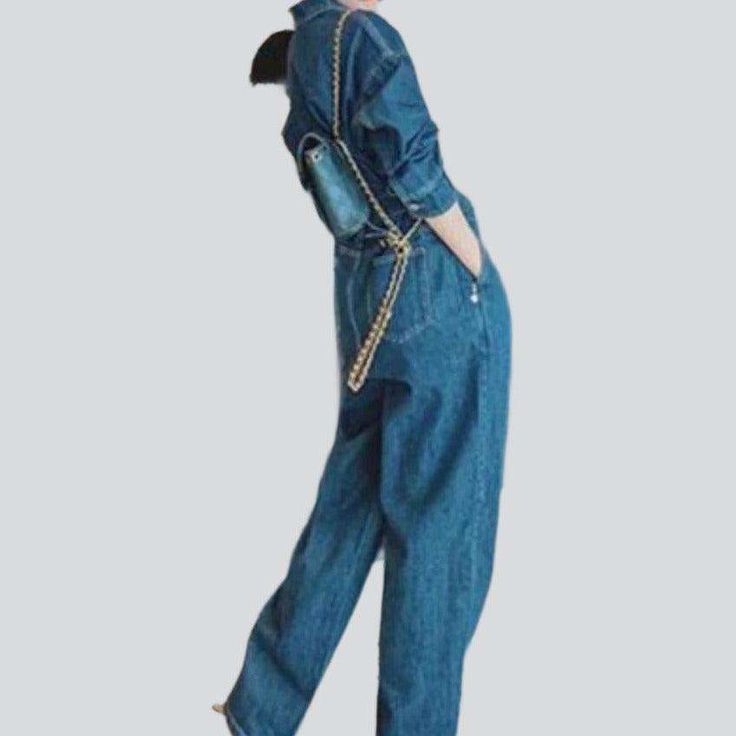 Be the ultimate trendsetter with our contrast stitching baggy denim overall from 2023 Spring-Summer Collection! Perfect for any street trend enthusiast. this jumpsuit is an effortless mix of modern fashion and classic Y2K vibes.Why You'll Fall In Love Contrast Stitching: Featuring a contrast stitching design. this jumpsuit is an eye-catching mix of modern vibe and vintage chic. Baggy: Its loose fit guarantees unmatched comfort. allowing you to move gracefully and effortlessly. Buttoned Closure: Denim Blue Utility Jumpsuits And Rompers For Spring, Spring Utility Denim Blue Jumpsuits And Rompers, Summer Utility Style Straight Leg Jumpsuits And Rompers, Chic Denim Jumpsuit With Pockets, Blue Straight Leg Utility Denim Jumpsuit, Trendy Wide-leg Overalls For Workwear, Blue Utility Denim Jumpsuit With Straight Leg, Chic Medium Wash Denim Jumpsuit With Pockets, Blue Straight Leg Jumpsuit With Pockets