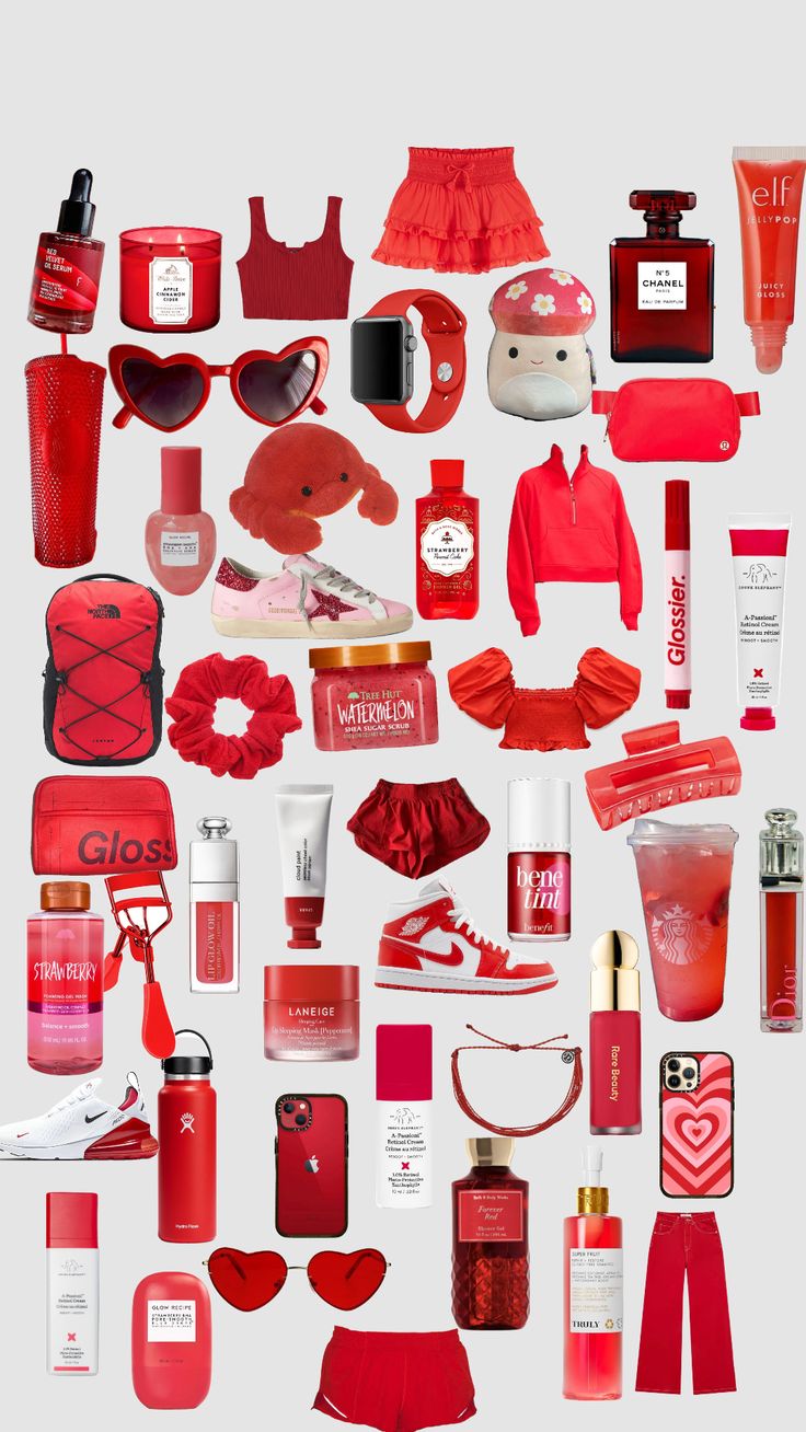 an assortment of red items arranged in the shape of a heart