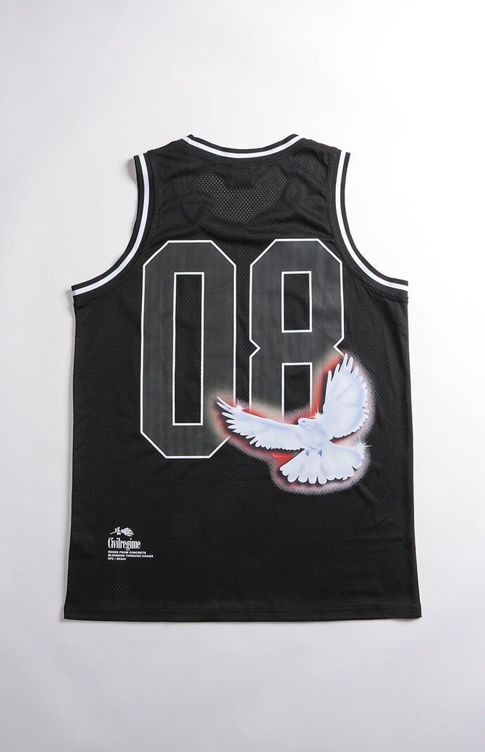 The Civil Regime Basketball Jersey Tank Top is a stylish blend of athletic and streetwear vibes. Designed with a crew neckline and sleeveless cut, this lightweight jersey offers maximum comfort and mobility. Featuring bold front and back brand graphics and a tag at the hem, this tank top is perfect for making a statement on or off the court.Crew necklineSleeveless armsLightweight jerseyFront & back graphicsRelaxed fitMachine wash cold, hang dry Civil Mens Basketball Jersey Tank Top - Black size Medium Spring Graphic Print Tank Top For Streetwear, Graphic Print Racerback Top For Streetwear, Black Sleeveless Basketball Jersey, Athleisure Sleeveless Tops For Streetwear, Athleisure Sleeveless Streetwear Top, Sleeveless Athleisure Tops For Streetwear, Black Sports T-shirt With Back Print, Sporty Sleeveless T-shirt With Letter Print, Sleeveless Graphic T-shirt For Sports Events