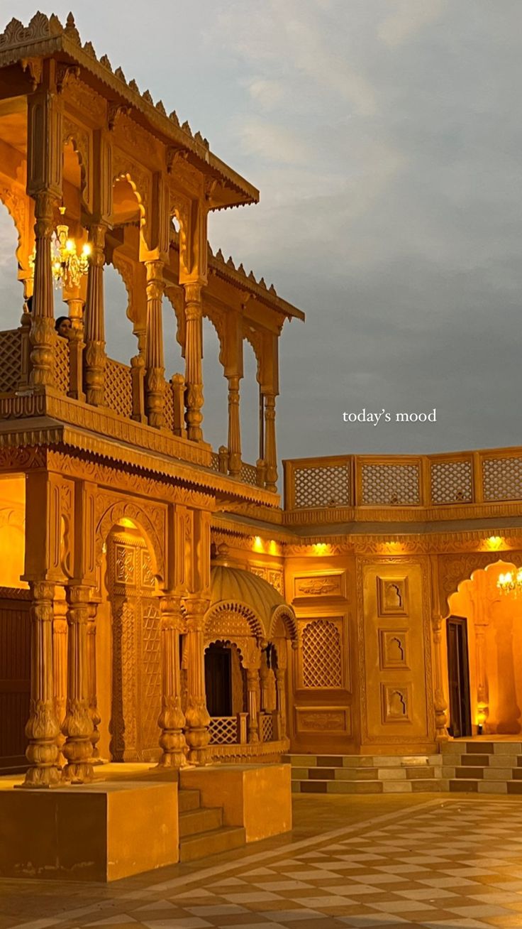 an ornate building lit up at night