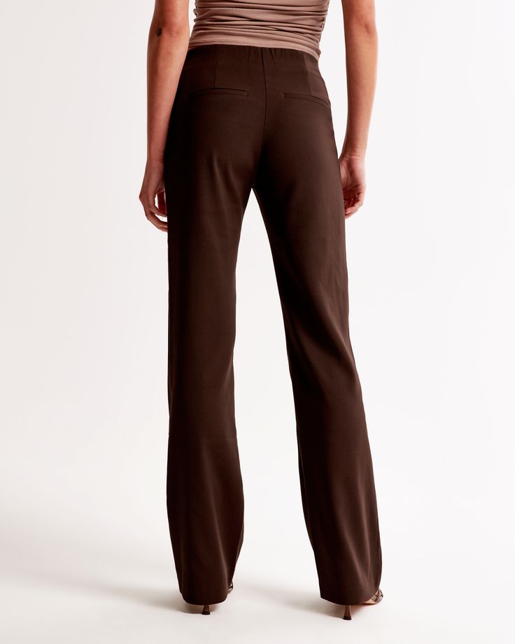 High rise pants, that are fitted at the waist and hips, slightly relaxed at the thigh and eases at the knee into a full-length boot leg shape, in our matte sculpt fabric, featuring a clean front waistband and a fly closure for a secure fit. Coffee Sizes, Women's Bottoms, High Rise Pants, Athletic Fits, New Arrival Dress, Swimwear Accessories, Trousers Women, The Knee, Jumpsuit Dress