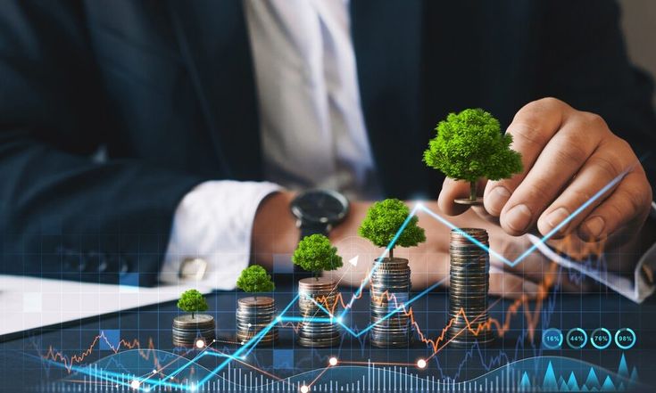 a man in a business suit is holding money and trees on top of stacks of coins