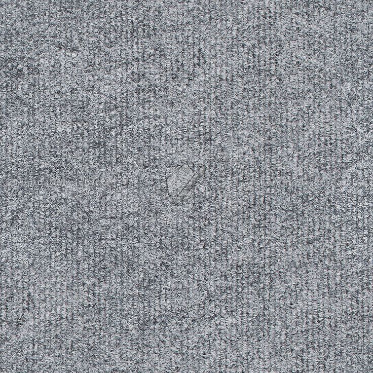 a gray carpet textured with small white dots