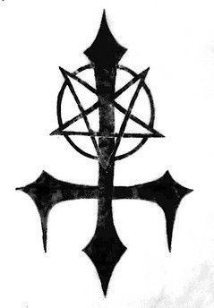 a black and white photo of a cross with an inverted pentagramil on it