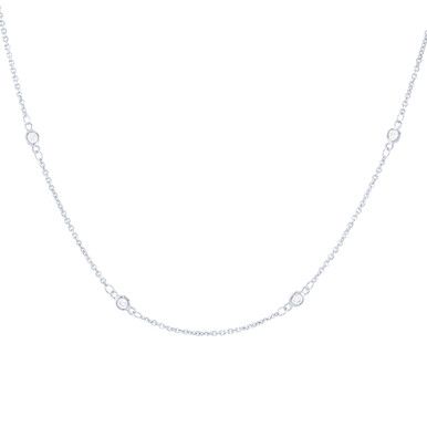 A staple in any jewelry collection this necklace features round brilliant cut diamonds in bezel stations. Elegant Bezel Setting Station Necklace, Elegant Bezel Set Station Necklace, Classic Station Necklace With Bezel Setting For Anniversary, Anniversary Bezel Setting Station Necklace, Classic White Gold Station Necklace With Bezel Setting, Classic Bezel Set Station Necklace For Anniversary, Classic Bezel Setting Station Necklace, Classic Necklace With Smooth Bezel, Luxury Cubic Zirconia Solitaire Necklace With Bezel Setting