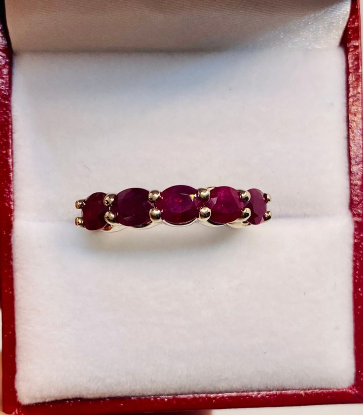 Absolutely Stunning Vintage 14k Yellow Gold Natural Rubies  band Ring 100%  Natural Rubies  Beautiful genuine Ruby 6x4 mm each 5 Rubies                                       2.25 CTW Clarity:                                              VS2 Total ring weight:                        4.1 GR 14K Yellow Gold Ring sizing available Free of Charge For more information regarding this item feel free to reach me so I can accommodate your needs.  Thank you Oval 14k Gold Eternity Band, 14k Gold Rings With Aaa Quality For Anniversary, High Quality 14k Gold Rings For Anniversary, Aaa Quality 14k Gold Rings For Anniversary, Elegant Oval Ruby Stackable Ring, Fine Jewelry Oval Stackable Rings With Prong Setting, Fine Jewelry Stackable Oval Ruby Ring, Stackable Oval Ruby Ring In Fine Jewelry, Fine Jewelry Oval Stackable Rings For Anniversary