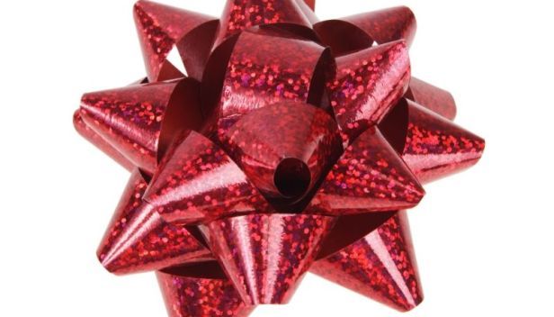 a close up of a shiny red object with lots of sparkles on it's surface