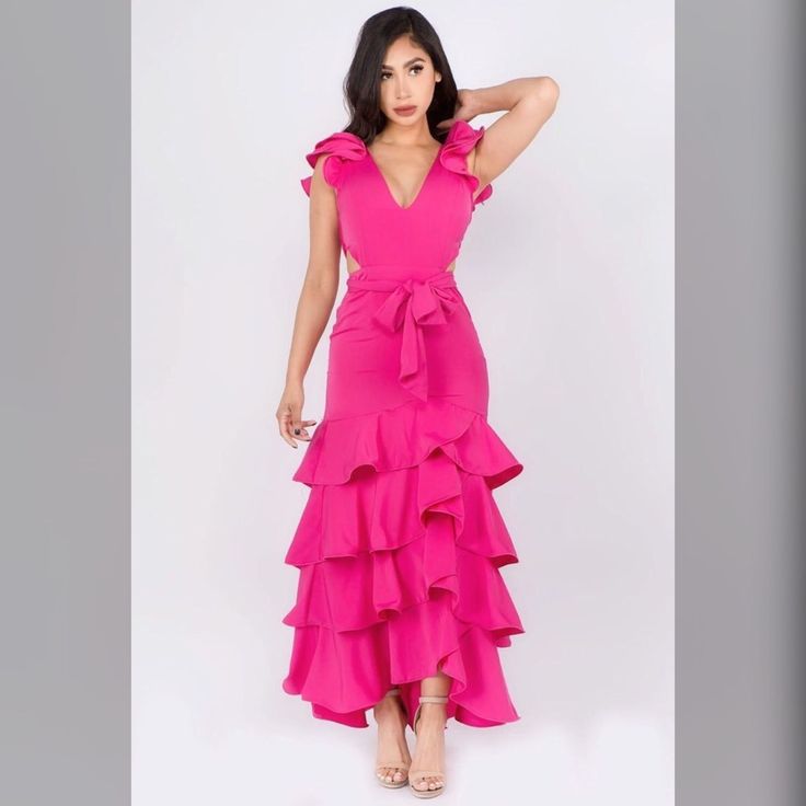 Perfect Look For Your Upcoming Events. -V-Neck -Ruffle Sleeves -Cut Sides -Waist Tie Up Party V-neck Maxi Dress With Ruffled Skirt, Pink V-neck Maxi Dress With Ruffles, Party Maxi Dress With V-neck And Ruffled Skirt, Party Maxi Dress With Ruffled Skirt And V-neck, Pink V-neck Dress With Ruffled Skirt, Feminine V-neck Maxi Dress With Ruffled Skirt, V-neck Maxi Dress With Ruffled Skirt, Boutique Maxi Dresses, Neck Ruffle