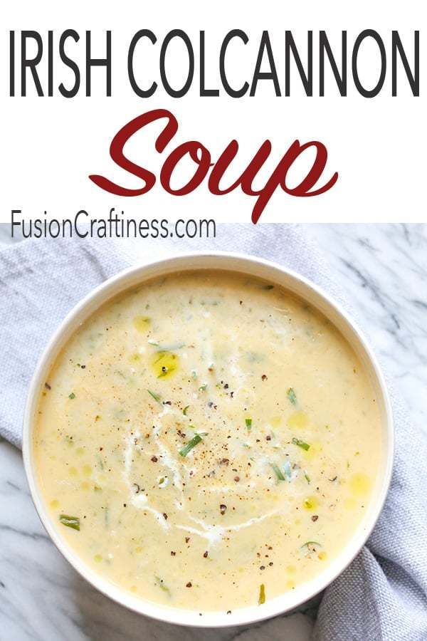 a white bowl filled with soup on top of a marble counter next to a blue towel