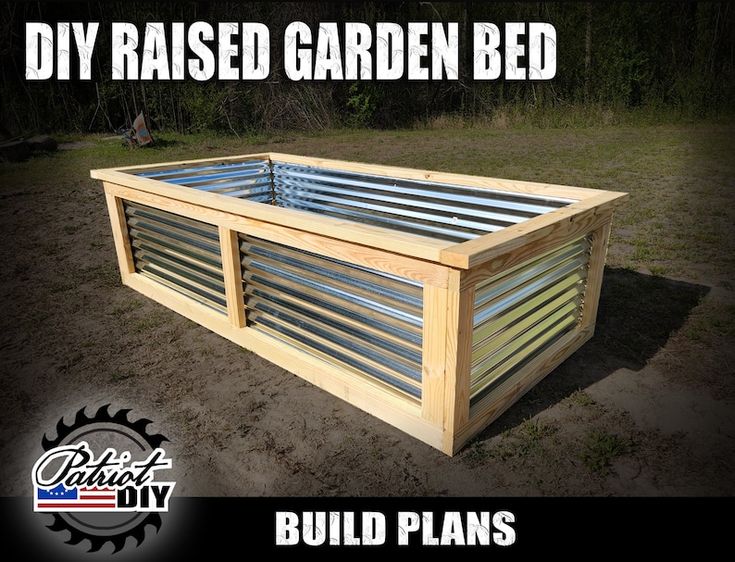 a raised garden bed made out of wood and metal slats with the words build plans below it