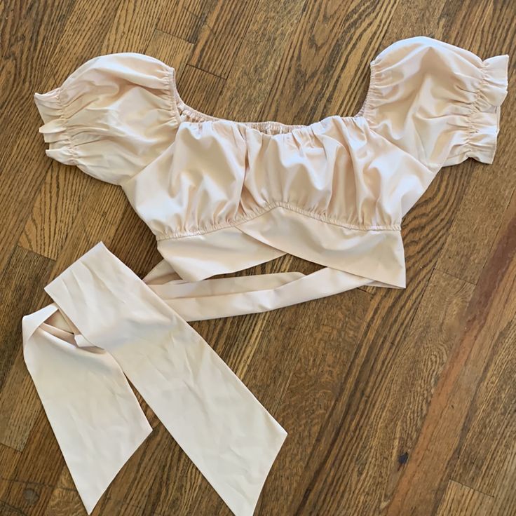 Lyaner Cream Peach Ruffle Tie Back Crop Top Medium Ties Up Back Can Wear Off The Shoulder Or On Shoulder As Short Sleeve So Cute! Nwot. Never Worn Medium Lyaner Brand Retails $45 Currently On Site And Ebay Color Is A Light Peach- Cream. So Pretty! New But Didn’t Come With A Tag Only In Bag Feminine Fitted Crop Top For Beach, Fitted Feminine Beach Crop Top, Fitted Feminine Crop Top For Beach, Fitted Peach Crop Top For Summer, Trendy Fitted Peach Crop Top, Fitted Cropped Peach Top, Fitted Peach Cropped Top, Trendy Fitted Apricot Top, Spring Peach Crop Top