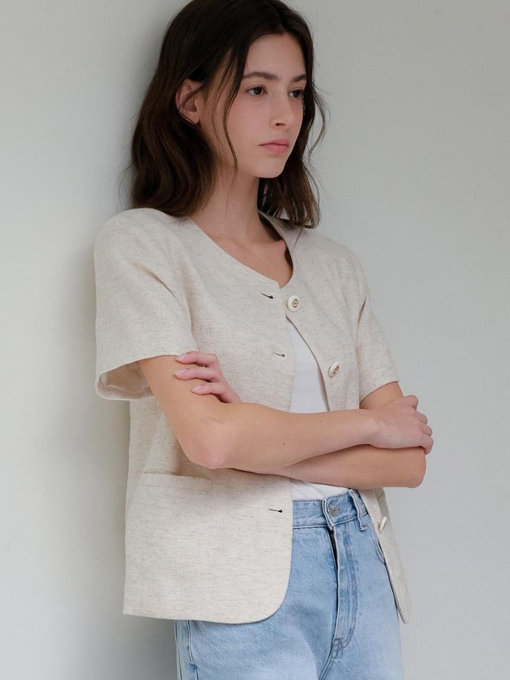 This is a minimal and feminine jacket by ourcomos that is made out of high quality and sturdy material. With distinctive mood of the design and comfortable wear, you can use it for your daily lifestyle.- Soft touch of linen and light cotton lining- Gold buttons on oatmeal fabric- Side pockets detail- Modern and minimal mood Beige Linen Casual Cardigan, Casual Beige Linen Cardigan, Beige Relaxed Fit Linen Cardigan, Beige Linen Cardigan With Relaxed Fit, Casual Cream Linen Outerwear, Feminine Jacket, Summer Linen, Cotton Lights, Tweed Jacket