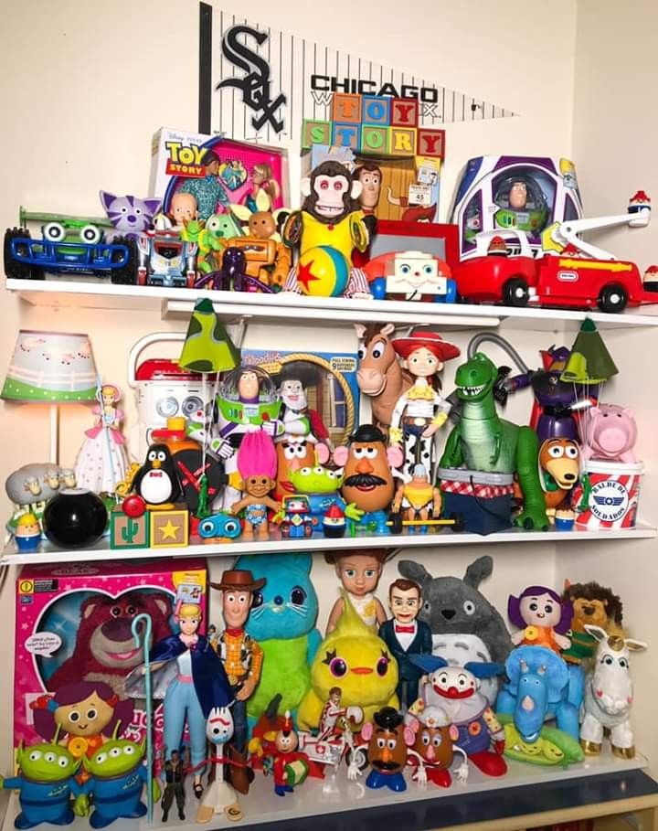 the shelves are filled with many different toys