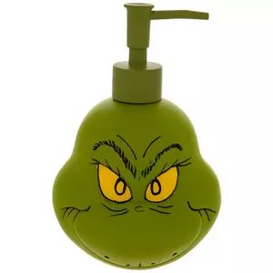 the grin face soap dispenser is green with yellow eyes