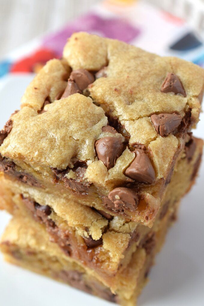 chocolate chip cookie bars stacked on top of each other