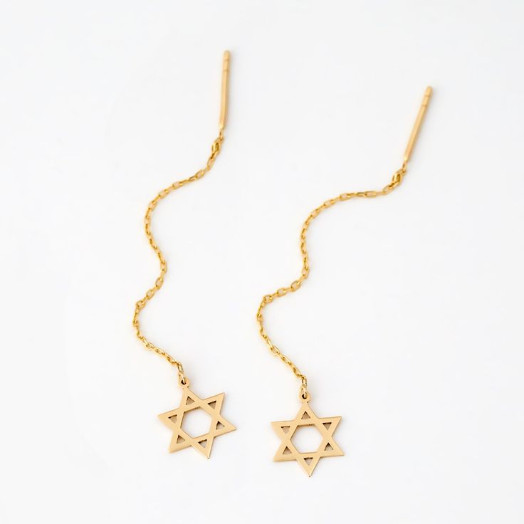 14K Solid Gold Star of David Threader Earrings Innovate your style with our Name Dangling Earrings in 14K Solid Gold. Exquisitely crafted, these custom earrings for women are the epitome of elegance and luxury. Made from 14k yellow gold, they dangle delicately, adding a touch of sophistication to any outfit. Perfect as a gift for her, these delicate earrings are not just jewelry, but a statement of class and timeless beauty. Enjoy the shine of solid gold earrings, designed to elevate your elegan Gold Threader Earrings, Threader Earrings Gold, Jewish Star, Solid Gold Earrings, Custom Earrings, Threader Earrings, Dangling Earrings, Star Of David, Delicate Earrings