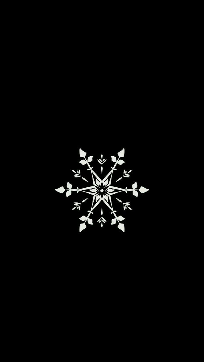 a snowflake is shown on a black background