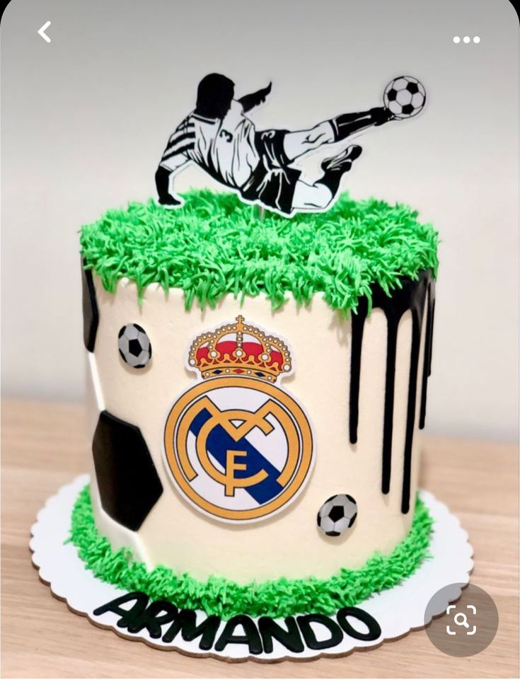 a cake that is decorated to look like a soccer player