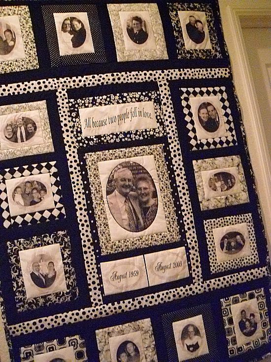 a black and white quilt with pictures on it