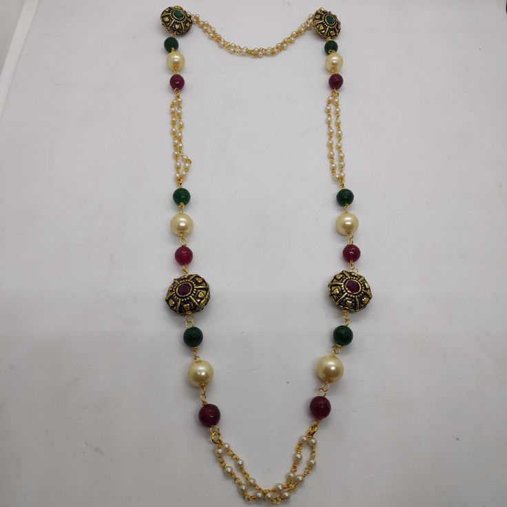 its a beautiful multicolor beadstring necklace. it has multi color beads along with antique beads and white pearl strings. you can wear it on all occasions. Traditional Pearl Necklaces With Colorful Beads, Traditional Pearl Beaded Necklaces With Colorful Beads, Festive Green Beaded Necklace With Pearl Chain, Festive Green Beaded Pearl Necklace, Multicolor Metal Beaded Chain Beads, Traditional Pearl Beaded Necklaces For Jewelry Making, Traditional Beaded Necklace With Colorful Metal Beads, Festive Long Beaded Necklace With Colorful Beads, Multicolor Metal Bead Necklaces