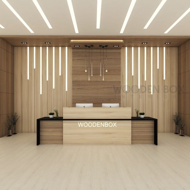 an empty wooden reception area with white chairs and wood panels on the wall behind it