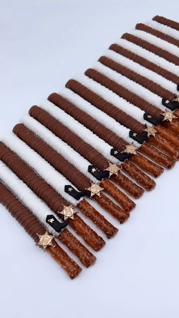 a row of brown and white hair clips with stars on them