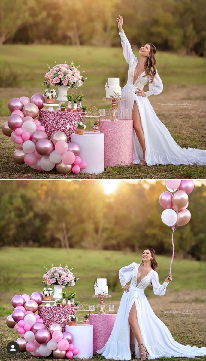 a woman in white dress standing next to a cake with pink balloons on it and holding a