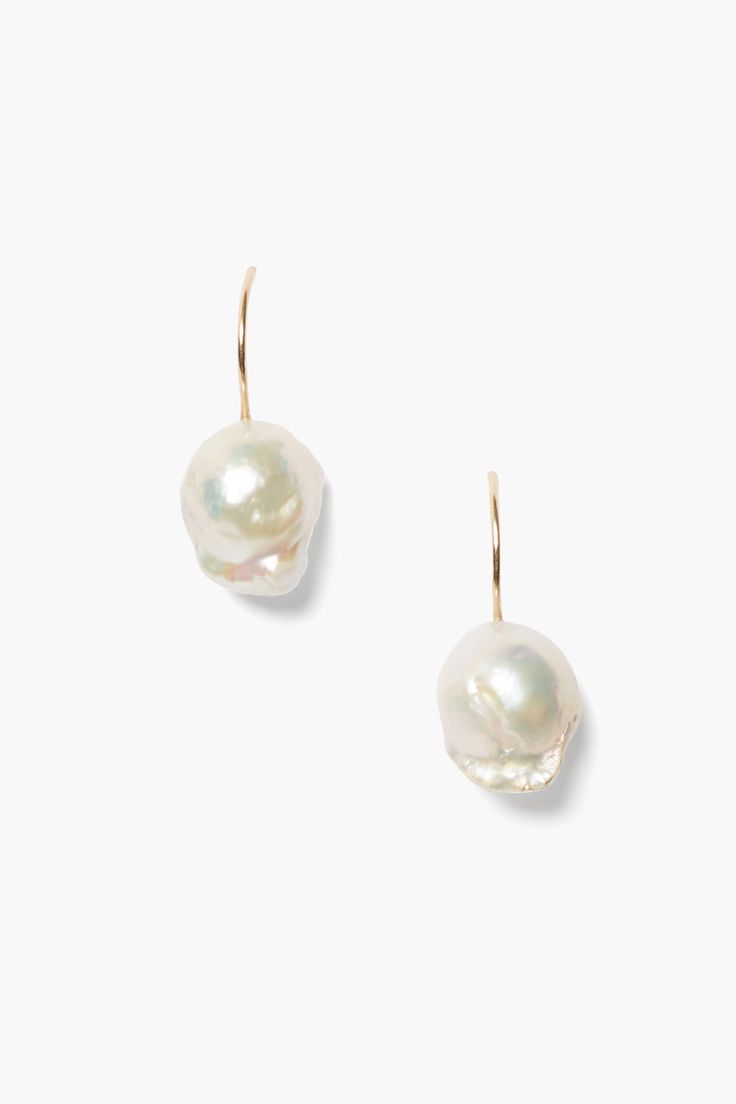 An essential piece you'll reach for everyday, this drop earring features a white baroque pearl drop on a 14k gold French hook. Pair with dainty gold earrings to perfect the layered look. Baroque pearls are one of a kind so size and shape may vary. 14k yellow gold. 1 1/8" drop. Handmade in Vietnam. Pearl Drop Earring, Keshi Pearl Earrings, Baroque Earrings, Trinity Necklace, Diamond Charm Necklace, Keshi Pearl Necklace, Dainty Gold Earrings, Elegance Wedding, Coastal Elegance