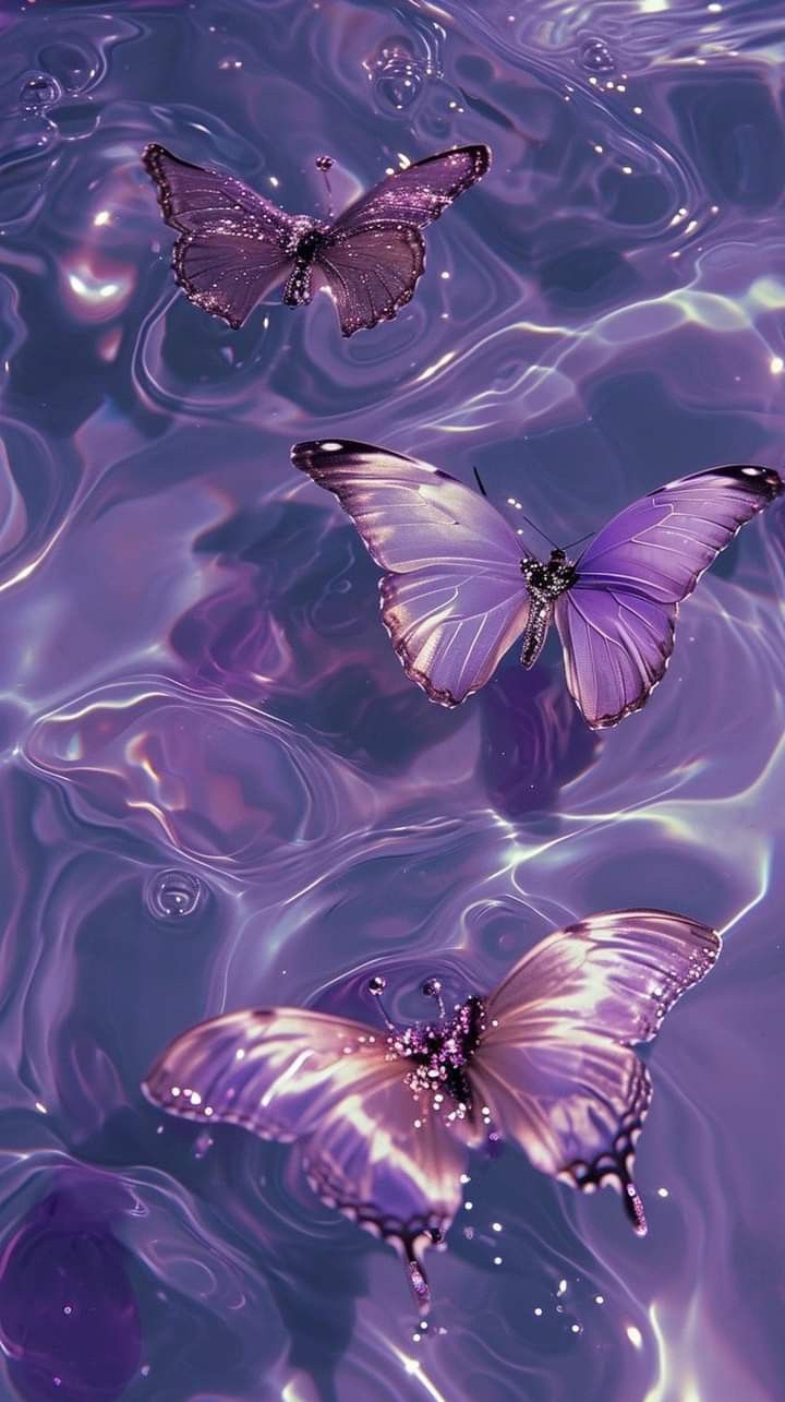 three purple butterflies floating in water with bubbles on the bottom and one flying above them