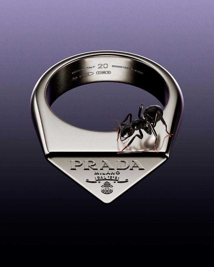 an antelope is standing on the inside of a ring that reads prada