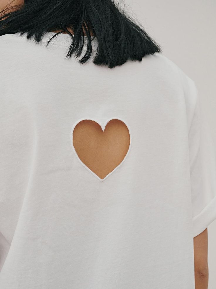 This is ODER’s unique t-shirt. While it features a clean design, the back showcases a heart-shaped cutout that adds a lovely and unique touch. Perfect for wearing alone or layered with different colored inners for a pop of color.- Ideal for daily wear, combining comfort and style- Perfect for pairing with various styles of bottoms- Its unique design ensures it complements any look effortlessly Embroidered T Shirt, Unique T Shirt, Embroidered Tshirt, Clean Design, Unique Tshirts, Daily Wear, Unique Design, Color Pop, Unique Designs