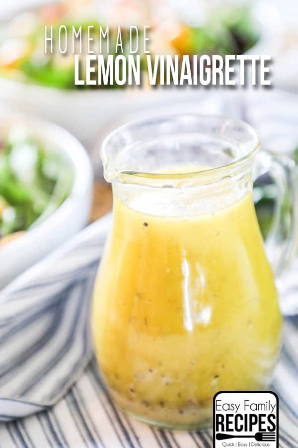 homemade lemon vinaigrette recipe in a glass jar on a striped table cloth