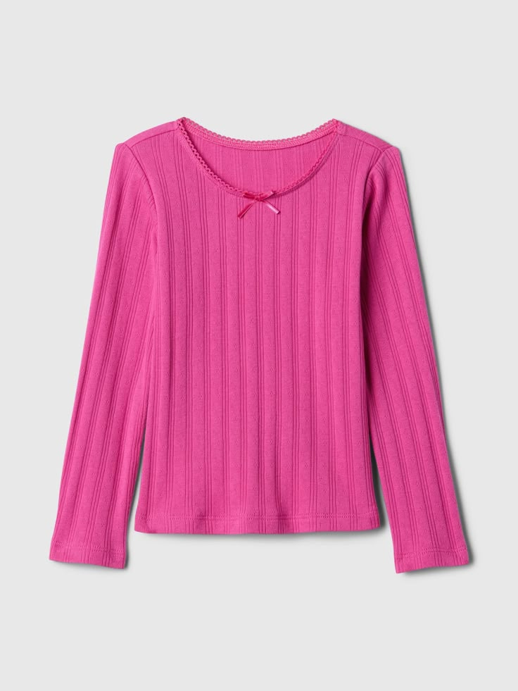 Soft cotton pointelle T-Shirt Round neck with bow applique.  Long sleeves.  Straight, easy fit.  Hits at the hip.  Sizes range from baby to toddler. Lace Bow Shirt, Long Sleeve Cotton Top With Pointelle Knit, Gap Tops For Spring, Gap Pink Crew Neck Top, Pink Gap Tops For Fall, Gap Pink Tops For Fall, Solid Color Pointelle Knit Crew Neck Tops, Solid Color Crew Neck Pointelle Knit Tops, Solid Crew Neck Pointelle Knit Tops