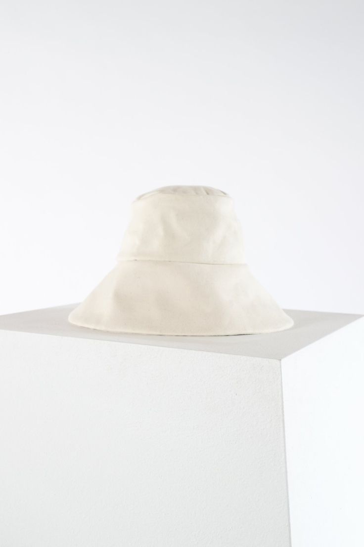 Walker - Janessa Leone Modern Everyday Hats For Spring, Cotton Wide Brim Hat For Everyday, Everyday Cotton Wide Brim Hat, Modern Everyday Spring Hats, Solid Cotton Sun Hat For Everyday, Solid Color Cotton Sun Hat For Everyday, Cotton Sun Hat For Everyday Use, Everyday Cotton Sun Hat, Everyday Cream Cotton Sun Hat