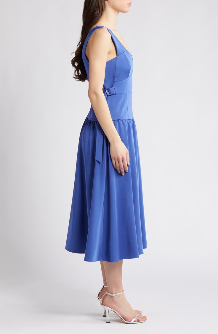 Move with ease from day to dinner in this sleeveless midi designed with a structured bodice featuring adjustable side belts and a flowy skirt. 50" length (size Medium) Hidden back-zip closure V-neck Sleeveless Adjustable buckle side belts Partially lined 92% polyester, 8% spandex Machine wash, line dry Imported Blue Belted A-line Midi Dress, Sleeveless Belted Dress For Evening, Formal Sleeveless Belted Dress, Sleeveless Belted Evening Midi Dress, Sleeveless Belted Midi Dress For Cocktail, Blue A-line Belted Midi Dress, Fitted Sleeveless Belted Midi Dress, Blue Knee-length Belted Summer Dress, Fitted Belted Sleeveless Midi Dress