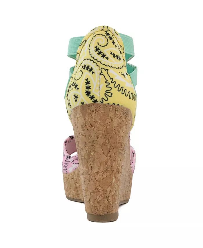 a woman's shoe that is covered in cork