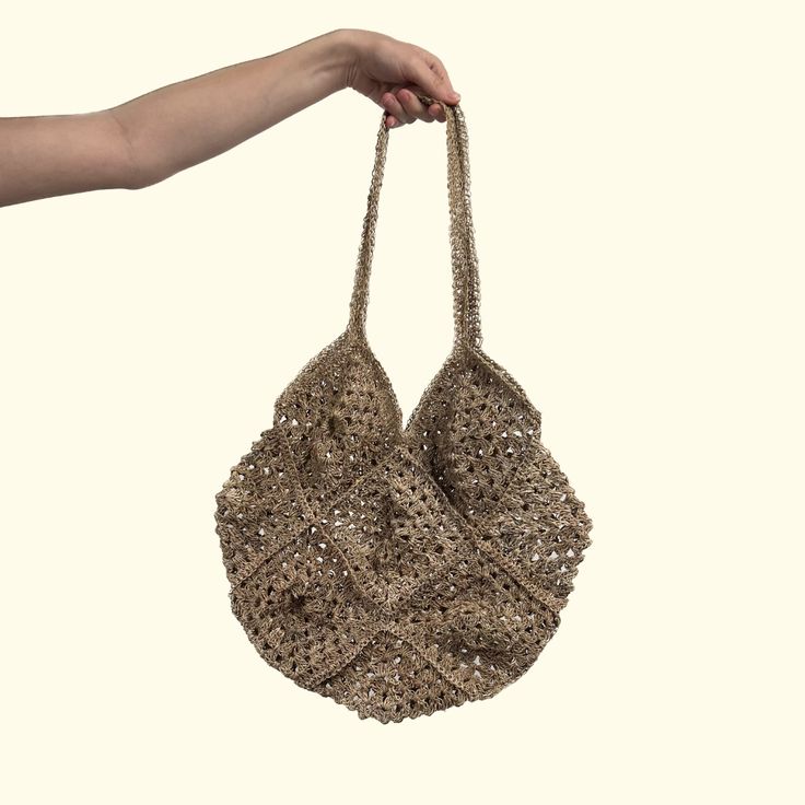 Intertwined's hemp crocheted market bags are the epitome of sustainable style! Handcrafted with care, these bags are meticulously crocheted using high-quality hemp fibers. Embrace eco-consciousness as you shop, knowing that hemp is a renewable resource that requires minimal water and no pesticides to grow. Our market bags are not only sturdy and durable but also incredibly versatile, capable of carrying your groceries, beach essentials, or everyday items with ease. With their intricate crochet p Eco-friendly Crochet Straw Tote Bag, Eco-friendly Handmade Crochet Bag, Fair Trade Jute Crochet Bag For Beach, Eco-friendly Jute Crochet Tote Bag, Eco-friendly Brown Crochet Bag With Open Weave, Eco-friendly Handwoven Natural Crochet Bag, Eco-friendly Beige Crochet Bag For Shopping, Eco-friendly Open Weave Straw Bag For Market, Eco-friendly Crochet Bags In Natural Fiber